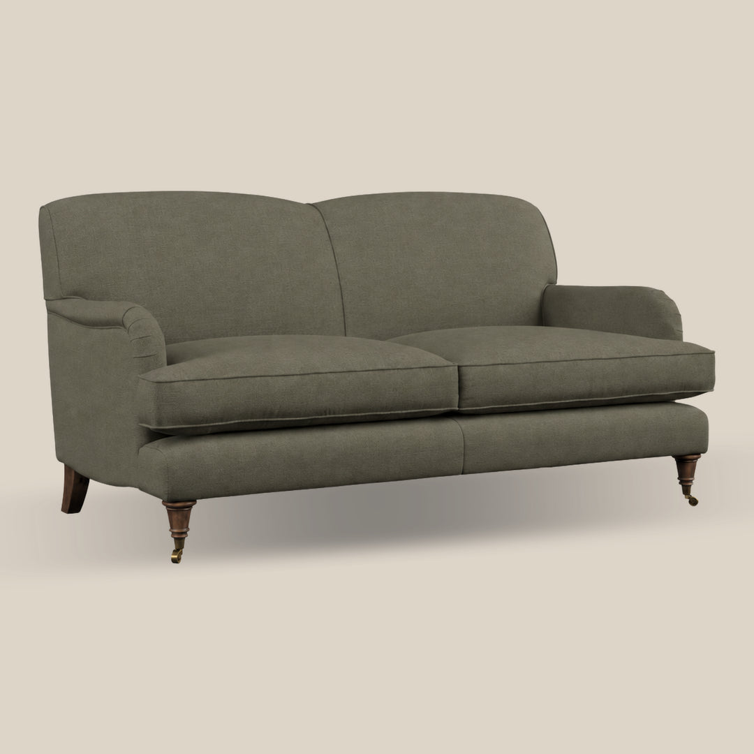 A two-seater howard sofa upholstered in green linen fabric with dark brown wooden legs, shown against a solid light beige background.