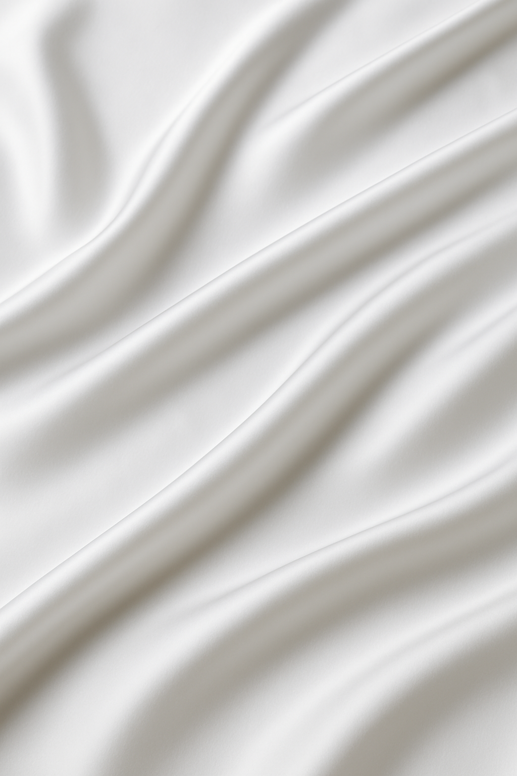 Close-up of white Egyptian cotton sateen with folds - Escapology Home