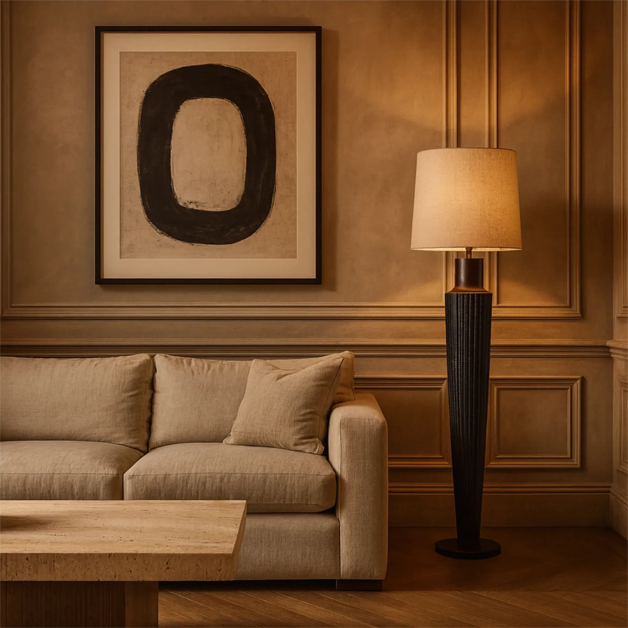 Lighting in a living room with beige sofa, wooden coffee table, and floor lamp against a wall with a large abstract painting