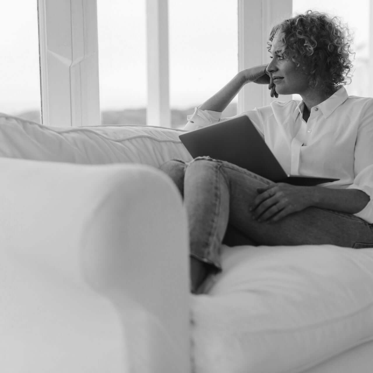 Female relaxing on an Escapology sofa